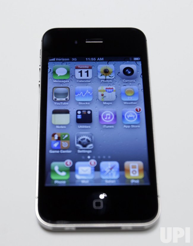 Photo: The new Verizon Wireless version of the iphone is on display for