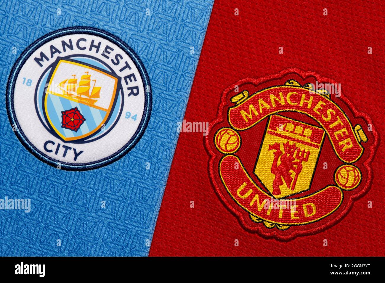 Close up of Manchester United & Manchester City club crest Stock Photo